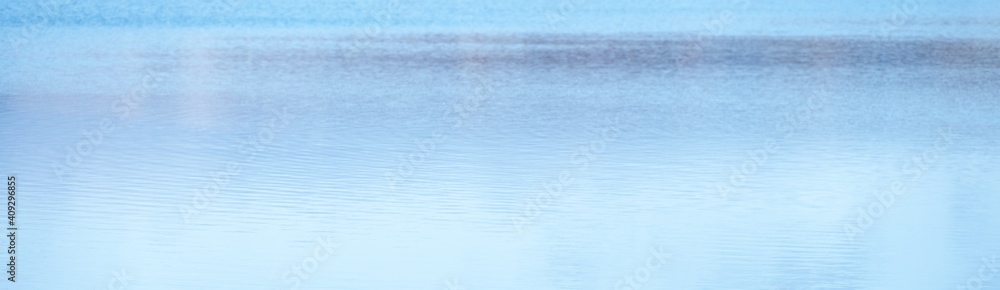 Calm water backdrop in panoramic format