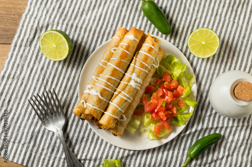 Homemade Mexican Chicken Flautas with Crema
