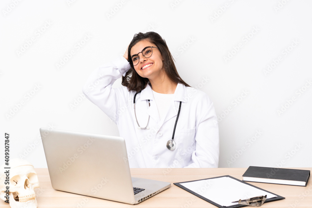 Professional traumatologist in workplace laughing Professional traumatologist in workplace laughing