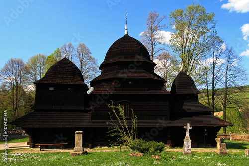 Old traditional wooden church in Rownia village, Bieszczady Mountains, Poland