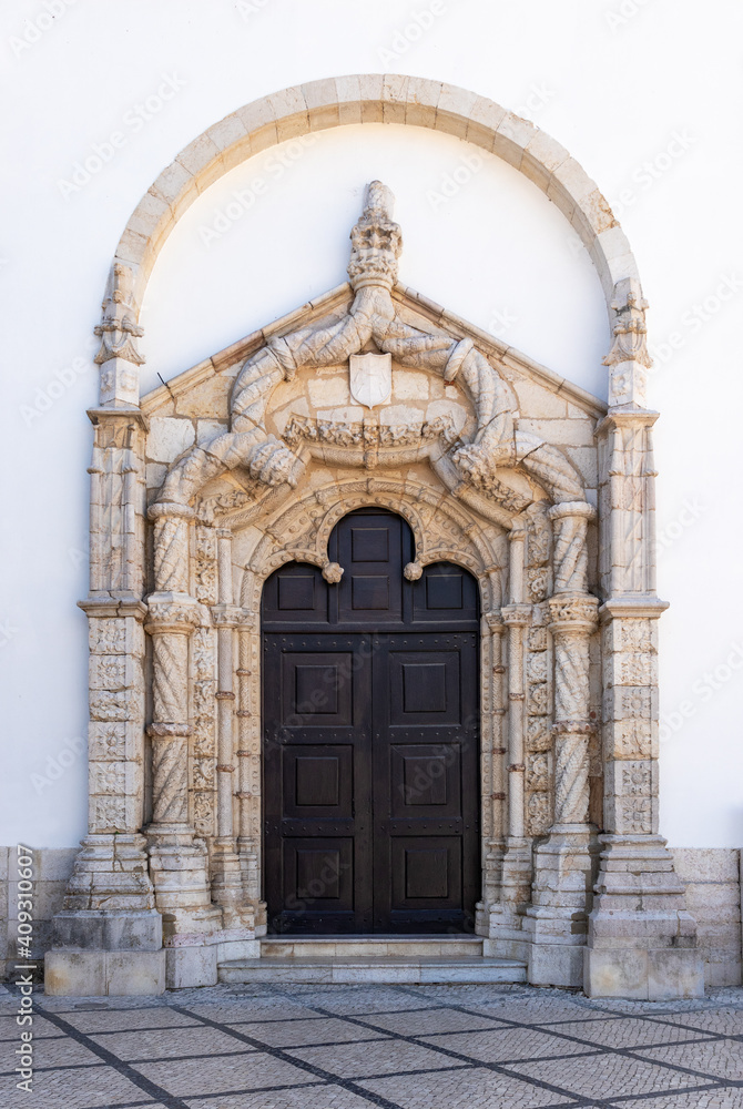 Manueline portal of the left side facade of the Church of São Julião in Setúbal, Portugal. Manueline portal of the left side facade of the Church of São Julião in Setúbal, Portugal.