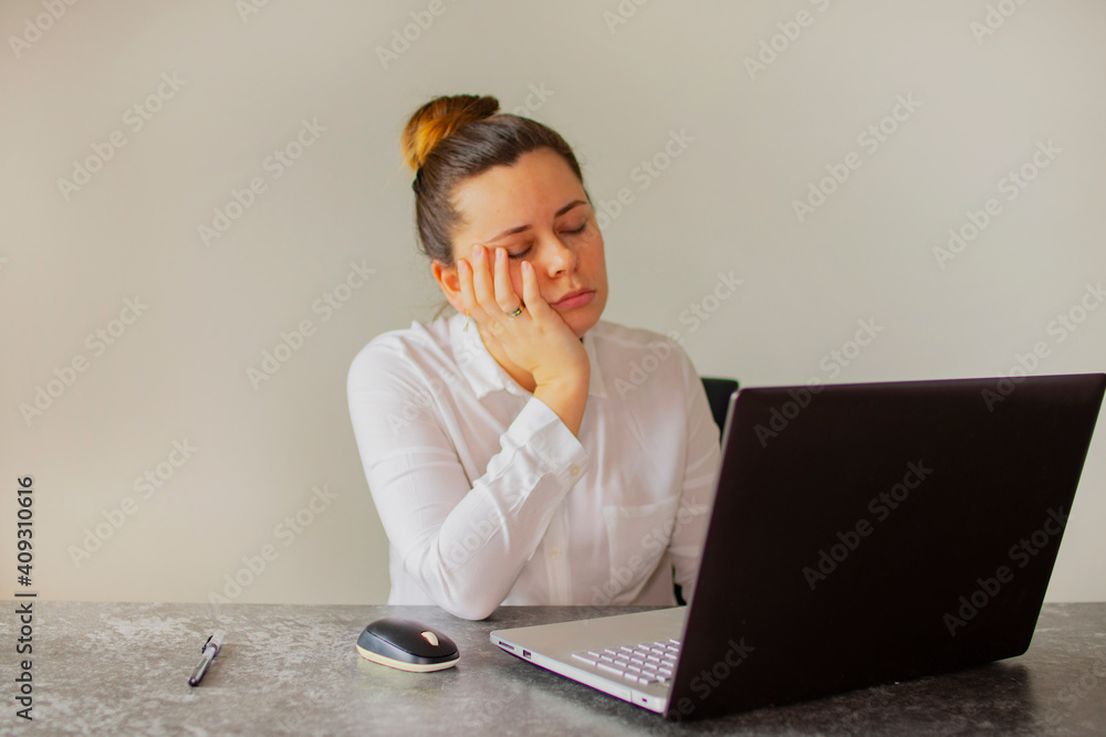 Office worker girl tired in the office Office worker girl tired in the office