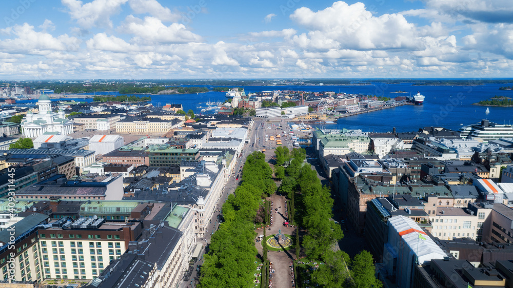 Fototapeta premium Scenic summer aerial panorama of the old town architecture in Helsinki, Finland. Beautiful sky with clouds. Travel concept.