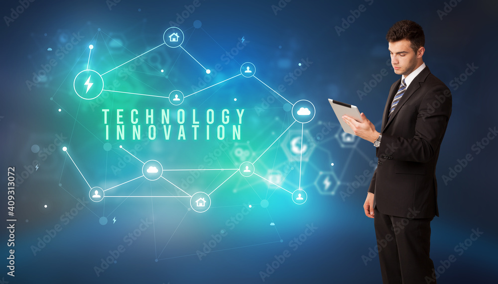 Businessman in front of cloud service icons with TECHNOLOGY INNOVATION inscription, modern technology concept Businessman in front of cloud service icons with TECHNOLOGY INNOVATION inscription, modern technology concept