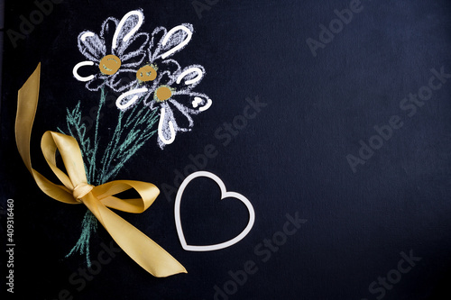 Postcard for the holiday of Valentine's Day, birthday, women's day. Blackboard with chalk-drawn flowers. Banner, postcard.