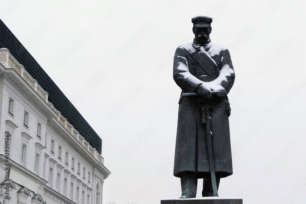 Jozef Pilsudski Monument at winter. Military leader, Marshal of Poland and one of the main figures responsible for Poland's regaining its independence. Warsaw, Poland  - obrazy, fototapety, plakaty 
