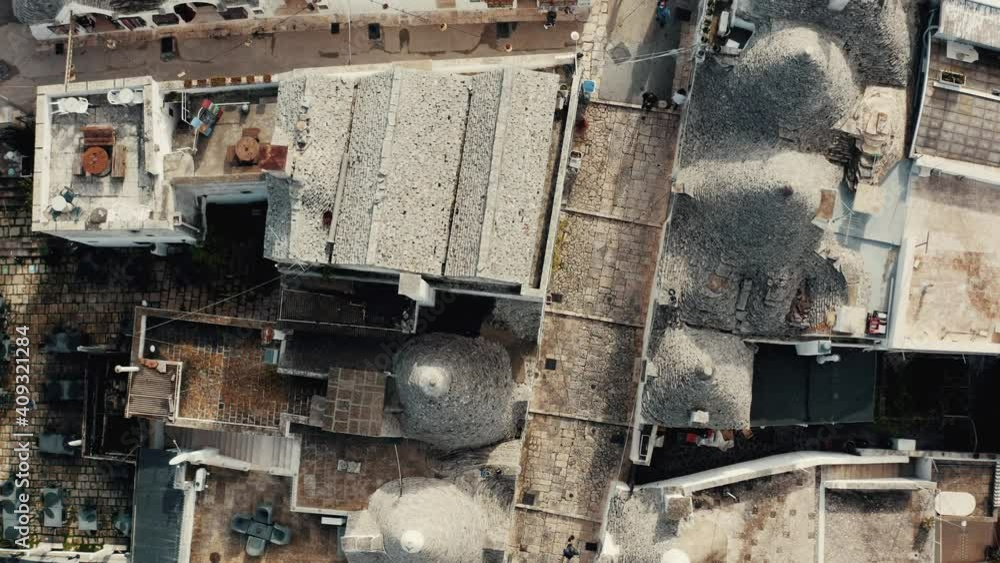 Aerial view over Alberobello in Italy. Aerial view over Alberobello in Italy.
