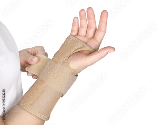 Elastic Wrist Bandage. Orthopedic medical Fitness Hand Bandage. Elastic Wrist Injury Support. Sport Protective Wristband Isolated on white background. Wrist Positioning Orthosis. Wrist pain. photo