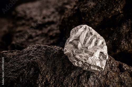 rare stone in ore. Precious nugget, metal used in jewelry, rough stone concept