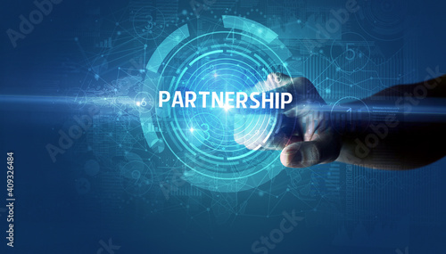 Hand touching PARTNERSHIP button, modern business technology concept