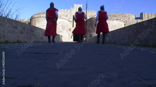 Rhodes Greece :A patrol of medieval knights guarding the main gate - entrance of the palace