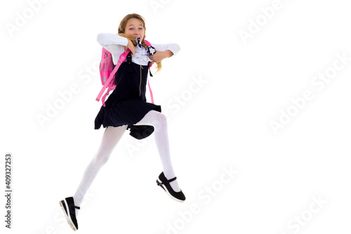 Happy schoolgirl running with backpack © lotosfoto