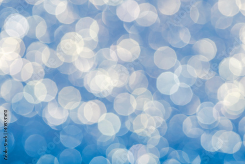 Blue christmas festive elegant abstract background with bokeh