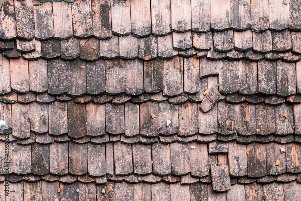 Wooden tiles on the antique roof. Background and texture Wooden tiles on the antique roof. Background and texture