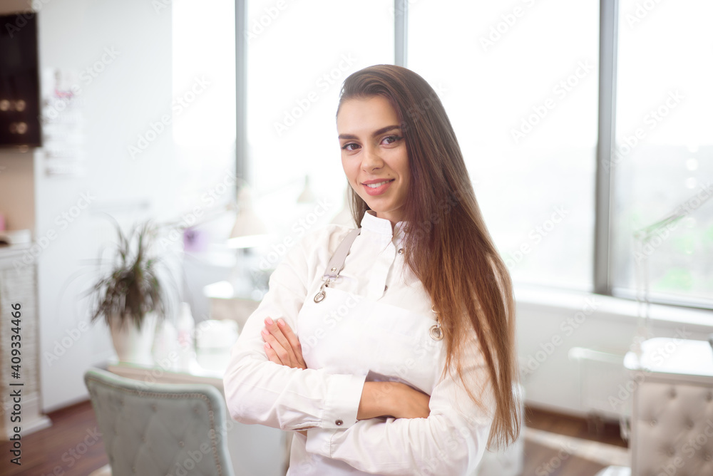 Professional manicurist at her workplace in beauty salon. Professional manicurist at her workplace in beauty salon.