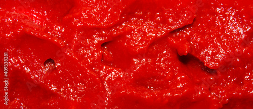 The texture of tomato paste.Ketchup background.Tomato sauce. © begun1983