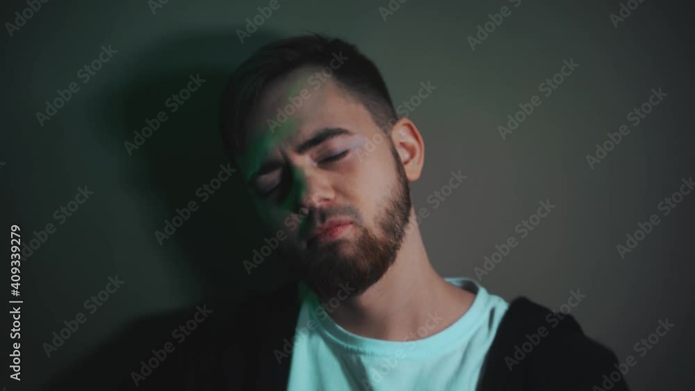A man of European appearance with a surprised happy face throws dollar bunks A man of European appearance with a surprised happy face throws dollar bunks