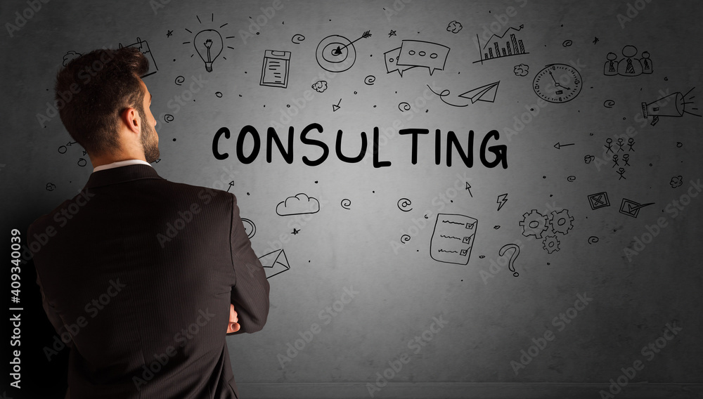 businessman drawing a creative idea sketch with CONSULTING inscription, business strategy concept businessman drawing a creative idea sketch with CONSULTING inscription, business strategy concept
