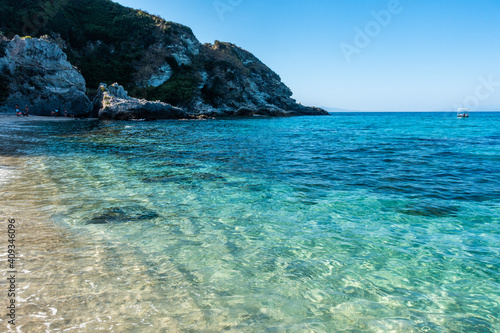 Fototapeta Naklejka Na Ścianę i Meble -  Clear turquoise sea waters at Grotticelle beach, Capo Vaticano, Calabria, Italy