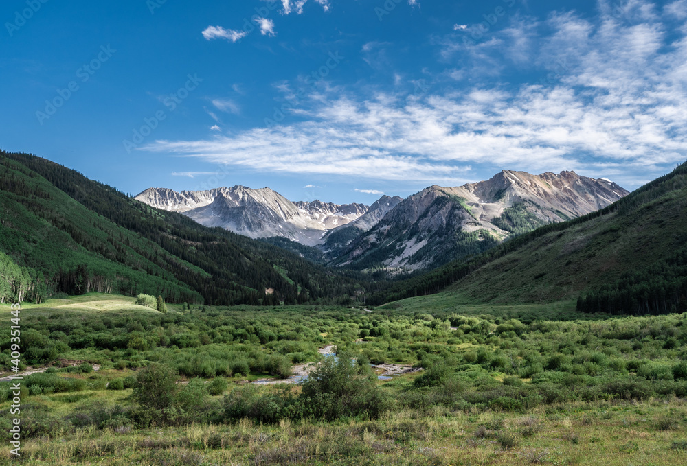 The Elk Mountains stand above the Ashcroft Ghost Town on Castle Creek Road near Aspen, Colorado and Ashcroft, Colorado in the Rocky Mountains