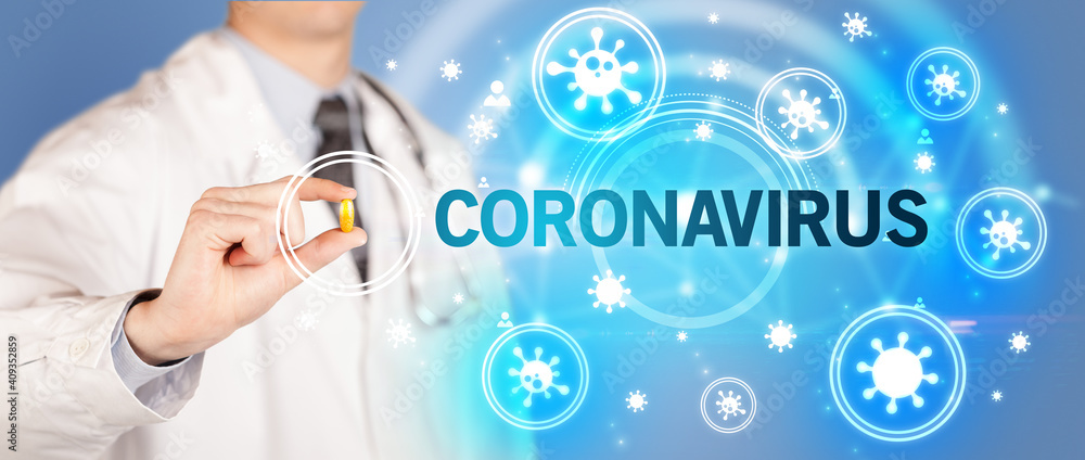 Doctor giving pill with CORONAVIRUS inscription, coronavirus concept Doctor giving pill with CORONAVIRUS inscription, coronavirus concept