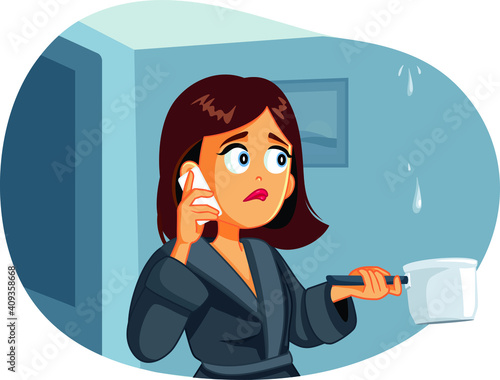Woman Calling the Plumber while the Ceiling is Leaking