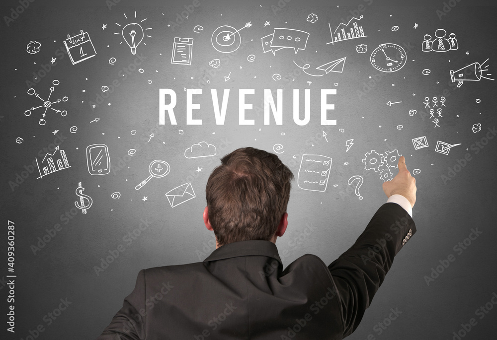 Rear view of a businessman with REVENUE inscription, modern business concept Rear view of a businessman with REVENUE inscription, modern business concept