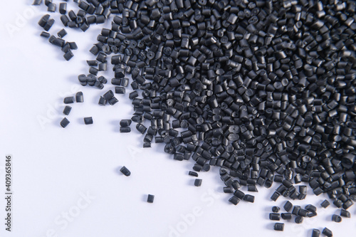 Polypropylene granule close-up background texture. plastic resin ( Masterbatch).Grey chemical granules for industrial plastic production.selective focus
