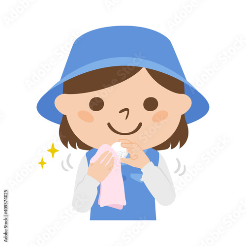 ゴルフ場で働く女性キャディのイラスト。ゴルフボールの汚れをタオルで清潔にしてる女性。