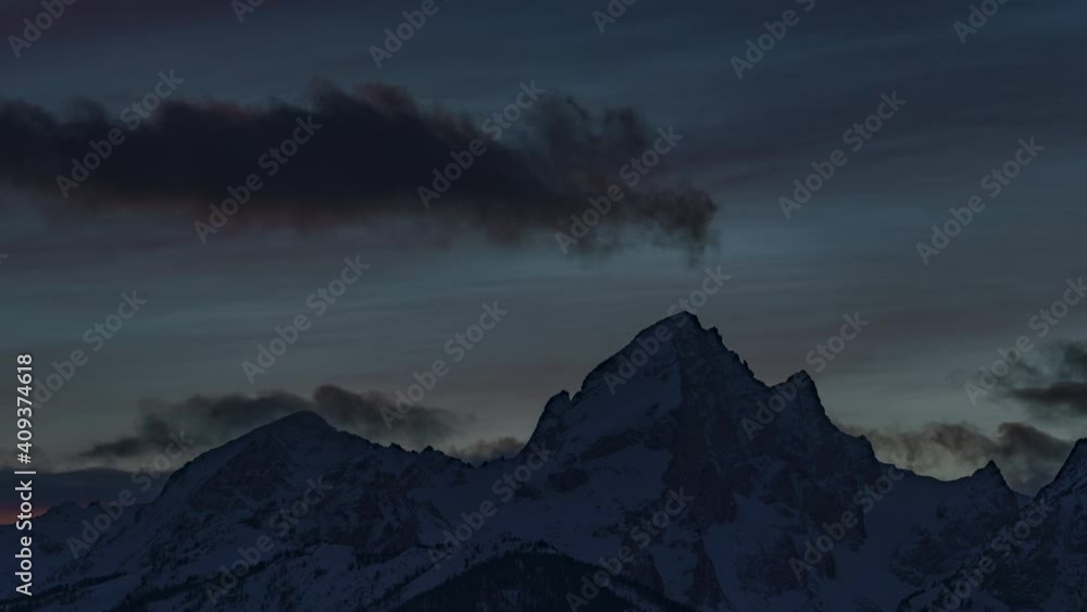 Closeup Timelapse of Sunset Clouds over Snow Capped Mountain Peaks of Grand Teton National Park Closeup Timelapse of Sunset Clouds over Snow Capped Mountain Peaks of Grand Teton National Park