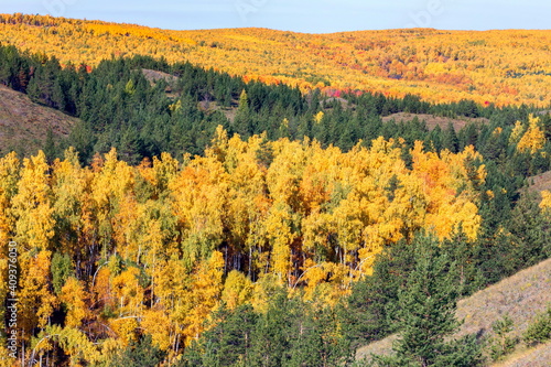 picturesque spurs of the Nurali ridge in the Ural Mountains in the Republic of Bashkortostan on an autumn day. photo