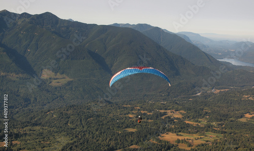 Paraglider launching from Mount Elk in Canada