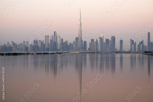 Dubai, UAE - 01.29.202 Sunrise over Dubai city skyline.Outdoors © Four_Lakes