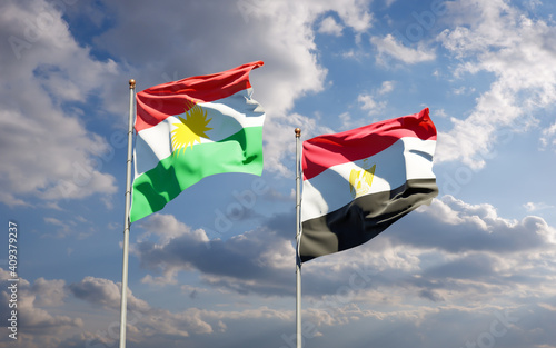 Flags of Kurdistan and Egypt.
