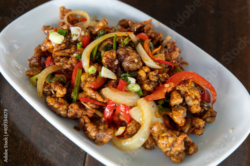 Chinese shredded pork with chili and onions photo