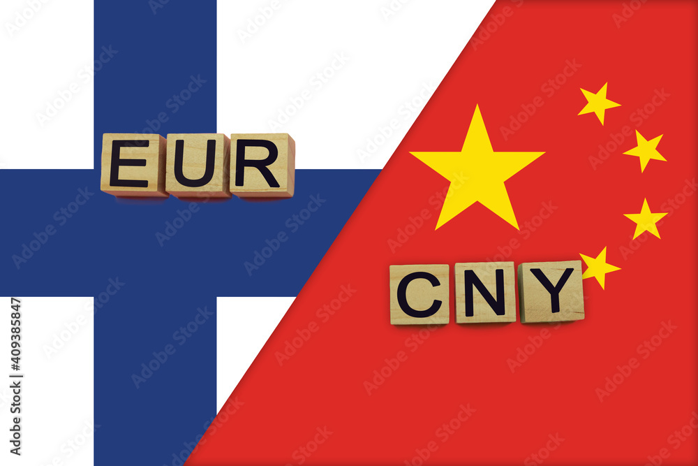 Finland and China currencies codes on national flags background Finland and China currencies codes on national flags background