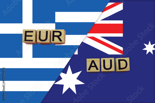 Greece and Australia currencies codes on national flags background