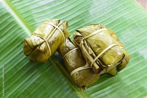 Thai traditional dessert Sticky rice wrapped in banana leaf steamed or boiled.