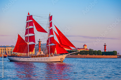 Saint Petersburg. Russia. Ship with scarlet sails on the background of Vasilievsky island. Brigantine with scarlet sails on the Neva. White nights in St. Petersburg. Holiday Scarlet sails.