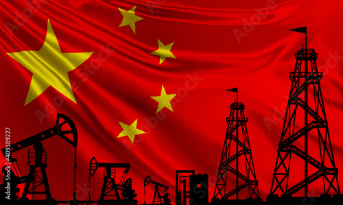 Photography Oil rigs on the background of the flag of China