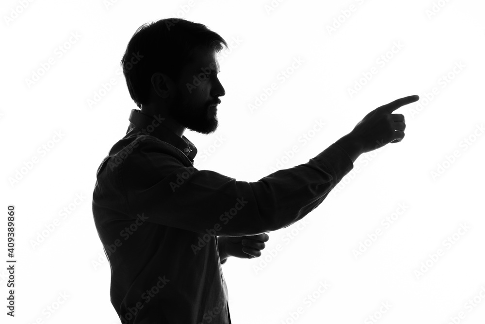 silhouette of a man and gesturing with his hands emotions mystic