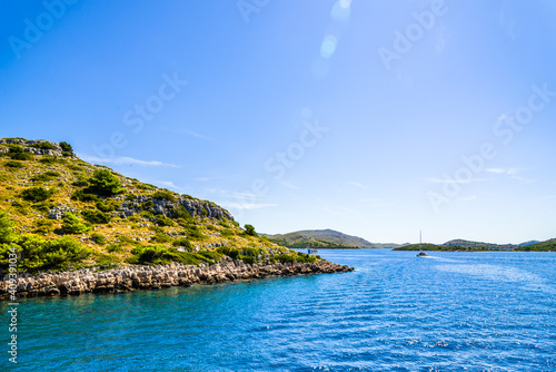 Adriatic coast of island with green plants, Mediterranean Sea, Croatia, Dalmatia