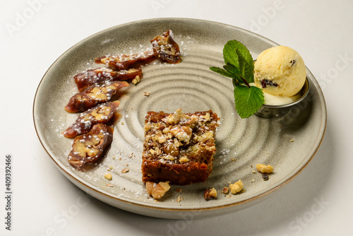 Churchkhela served on a ceramic plate over white background. Traditional Georgian dessert.