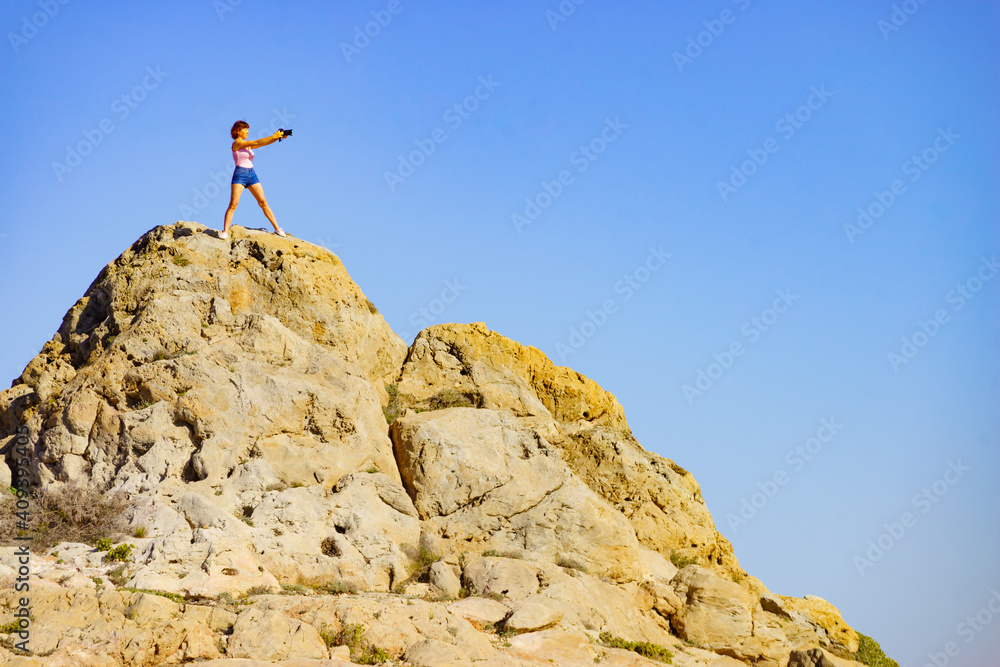 Woman with camera take travel photo Woman with camera take travel photo