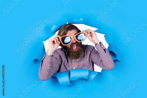 time to celebrate holidays. looking so stylish. going crazy and having fun. mature bearded man wear funny party glasses. brutal male hipster in summer sunglasses photo