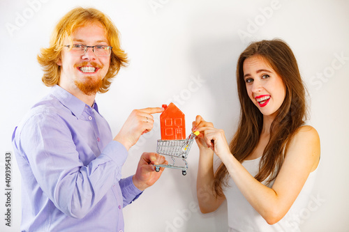 Happy young couple buying real eastate photo