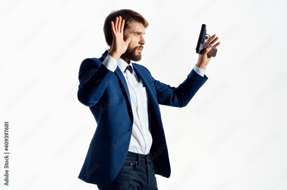 man in suit holding pistol danger gangster murder isolated background man in suit holding pistol danger gangster murder isolated background