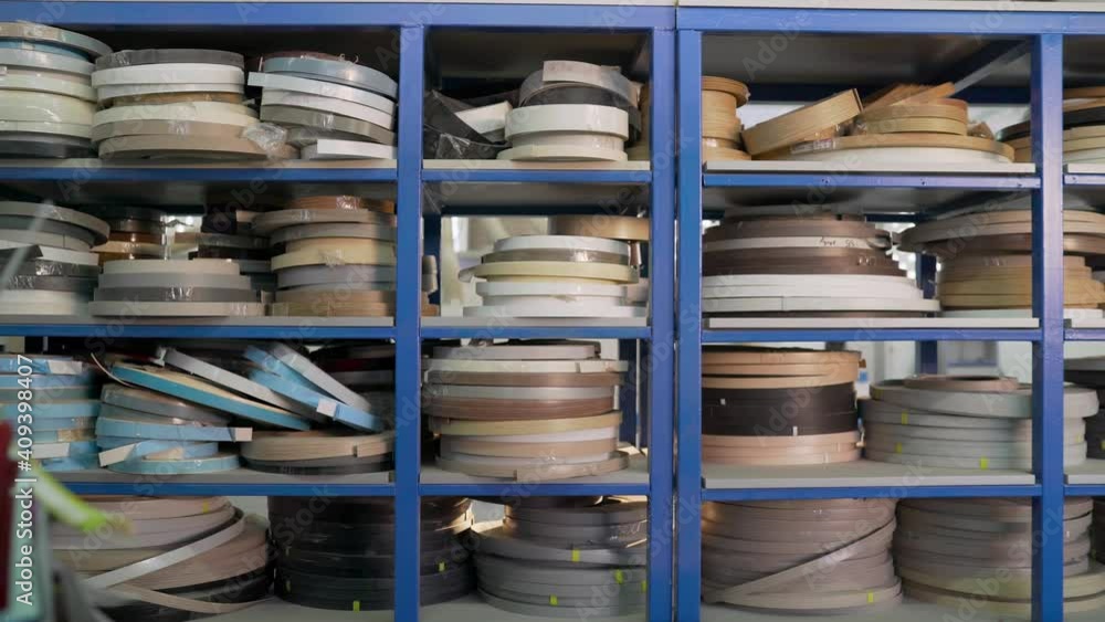 Adhesive edge for furniture on shelves. Edge Banding furniture