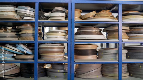 Edge Banding furniture. Furniture edges and plywood cuttings for use as textures or backgrounds. Adhesive edge for furniture on shelves.