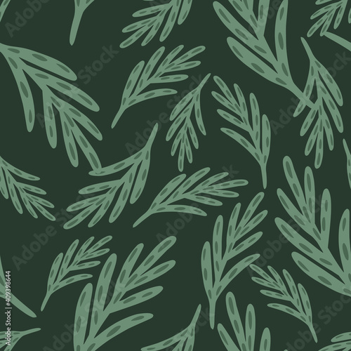 Seamless random pattern with green hand drawn foliage leaves shapes. Dark grey background. Nature backdrop.